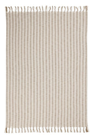 Classic Home Linna 50x70 inch ivory and natural throw blanket draped over a sofa, showcasing soft, cozy fabric and elegant design.