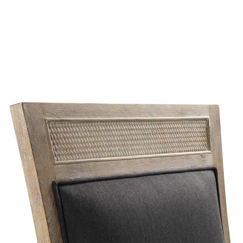 Dark gray Uttermost Encore armless side chair with sleek modern design and smooth upholstery.