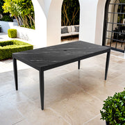 Modern outdoor patio dining table by Life Outside with tapered legs, weatherproof, rust-free, perfect for outdoor dining spaces.