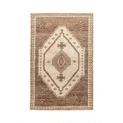Classic Home Luxor hand-knotted area rug with intricate patterns and warm colors, suitable for living room or bedroom decor.