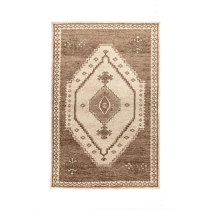 Classic Home Luxor hand-knotted area rug with intricate patterns and warm colors, suitable for living room or bedroom decor.