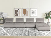 Lilola Home Anna stylish sectional sofa ottoman in beige fabric, with plush cushioning and modern design.