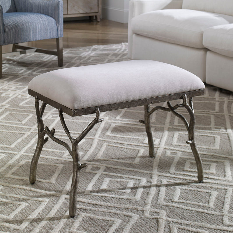 Uttermost Lismore small beige fabric accent bench with wooden legs, ideal for entryways or living room seating.