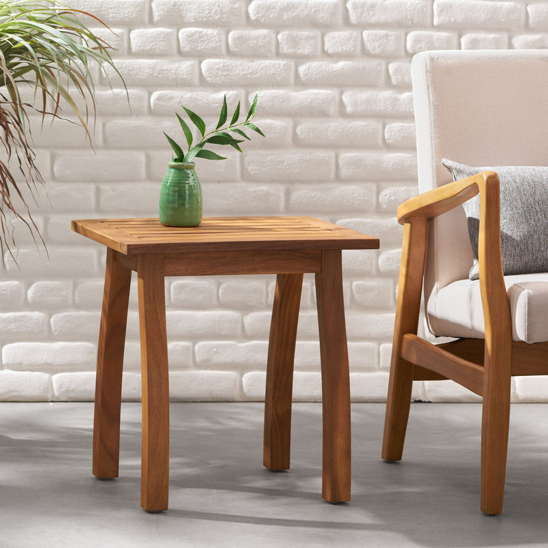 Noble House Kinesis outdoor side table with slatted top and wooden frame, ideal for patio or garden decor.