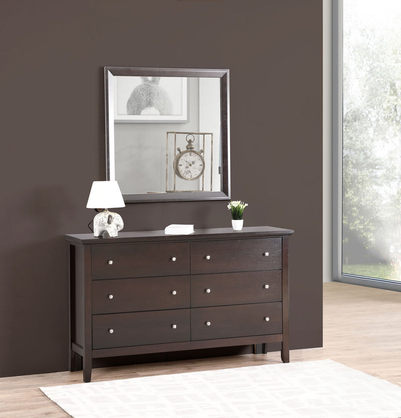 Glory Furniture Primo mirror with a sleek rectangular frame, hung on a wall, reflecting a modern interior space.