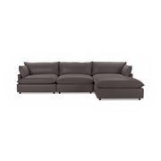 Classic Home Caplan modular sectional sofa with plush cushions and fabric upholstery, shown in a modern living room setting.