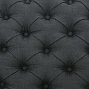 Dark gray Noble House contemporary storage ottoman with tufted top, showcasing a sleek, cushioned design suitable for living rooms.