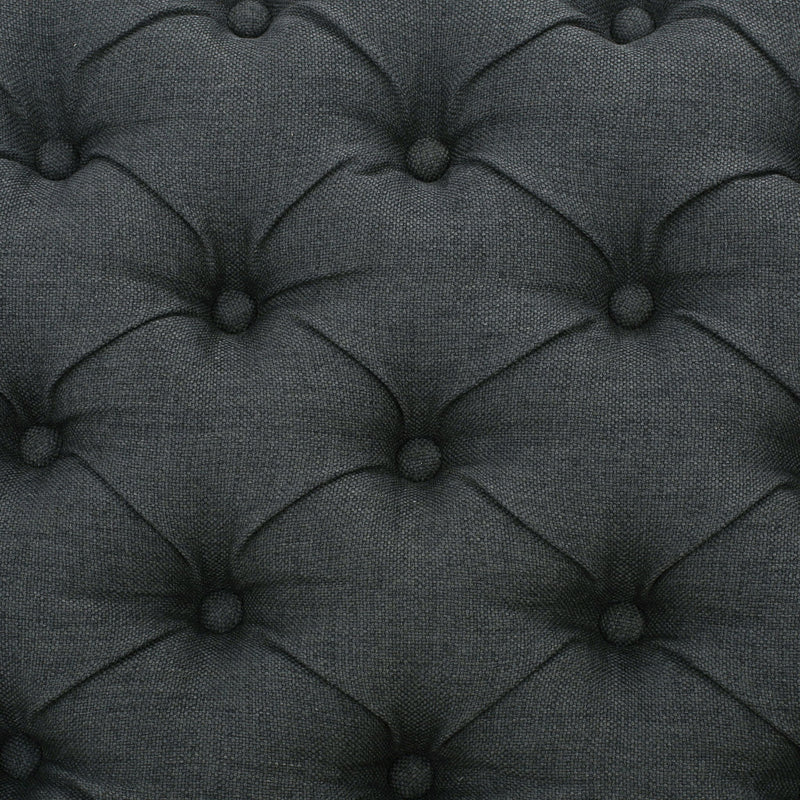 Dark gray Noble House contemporary storage ottoman with tufted top, showcasing a sleek, cushioned design suitable for living rooms.