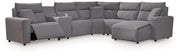 Signature Design by Ashley Modmax II reclining sectional in salt and pepper fabric, showing its plush cushions and reclining features.