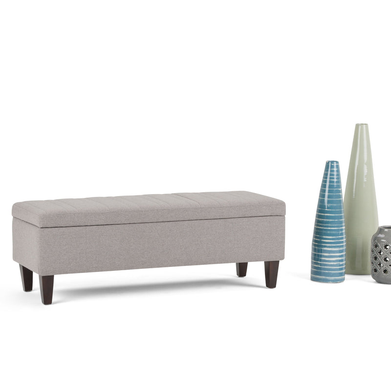 Simpli-Home Monroe upholstered storage ottoman with soft fabric and concealed storage space in a modern design