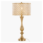 Lumi Source Topaz contemporary table lamp with sleek design and neutral-colored shade on a modern side table.