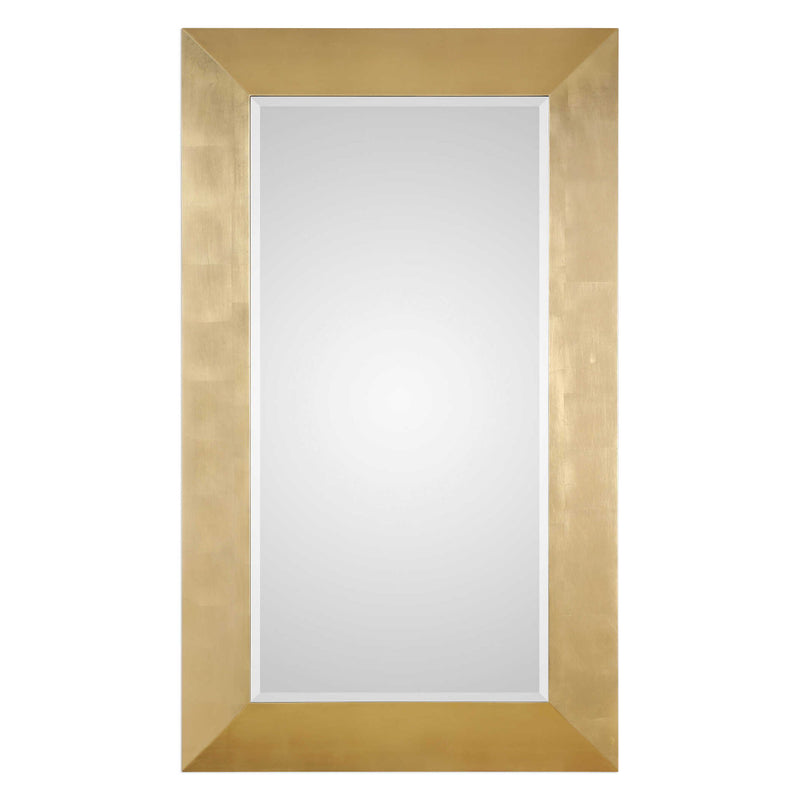 Uttermost Chaney gold wall mirror with a sleek, modern frame, mounted on a wall for stylish home decor.