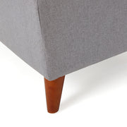 Light gray upholstered storage ottoman with lift-top and button-tufted seat by Noble House, perfect for extra seating and storage.