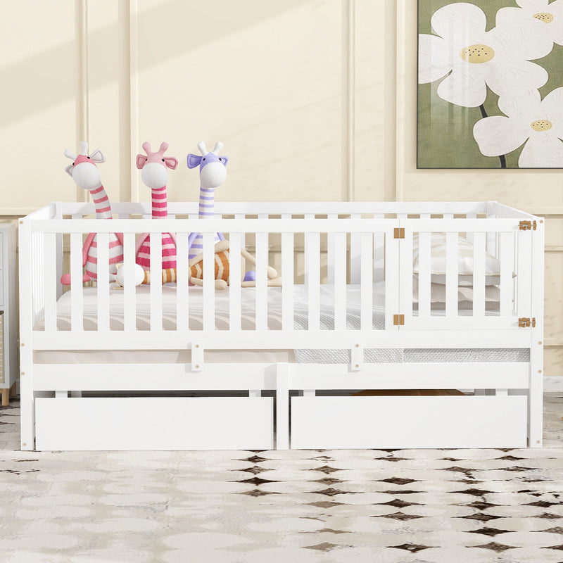 DreamHaus storage daybed with fence guardrails and two drawers, split into independent floor bed and daybed, shown with bedding.