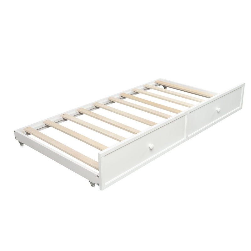 White twin size DreamHaus daybed with an open trundle bed underneath, featuring a clean, modern design and wooden legs.