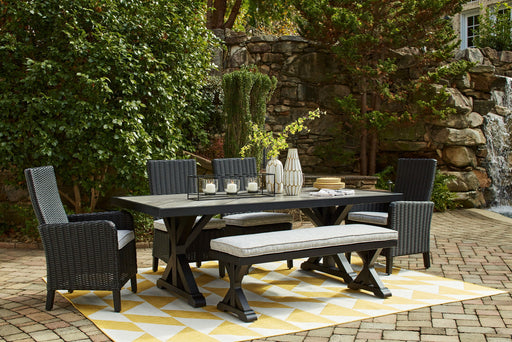 Seven-piece outdoor dining set by Signature Design Ashley, featuring a table and chairs for outdoor gatherings.