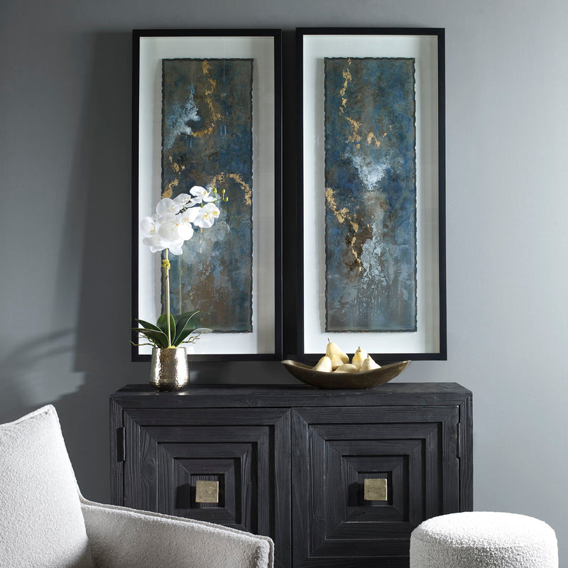Set of two framed abstract prints featuring blue glimmering agate designs by Uttermost.