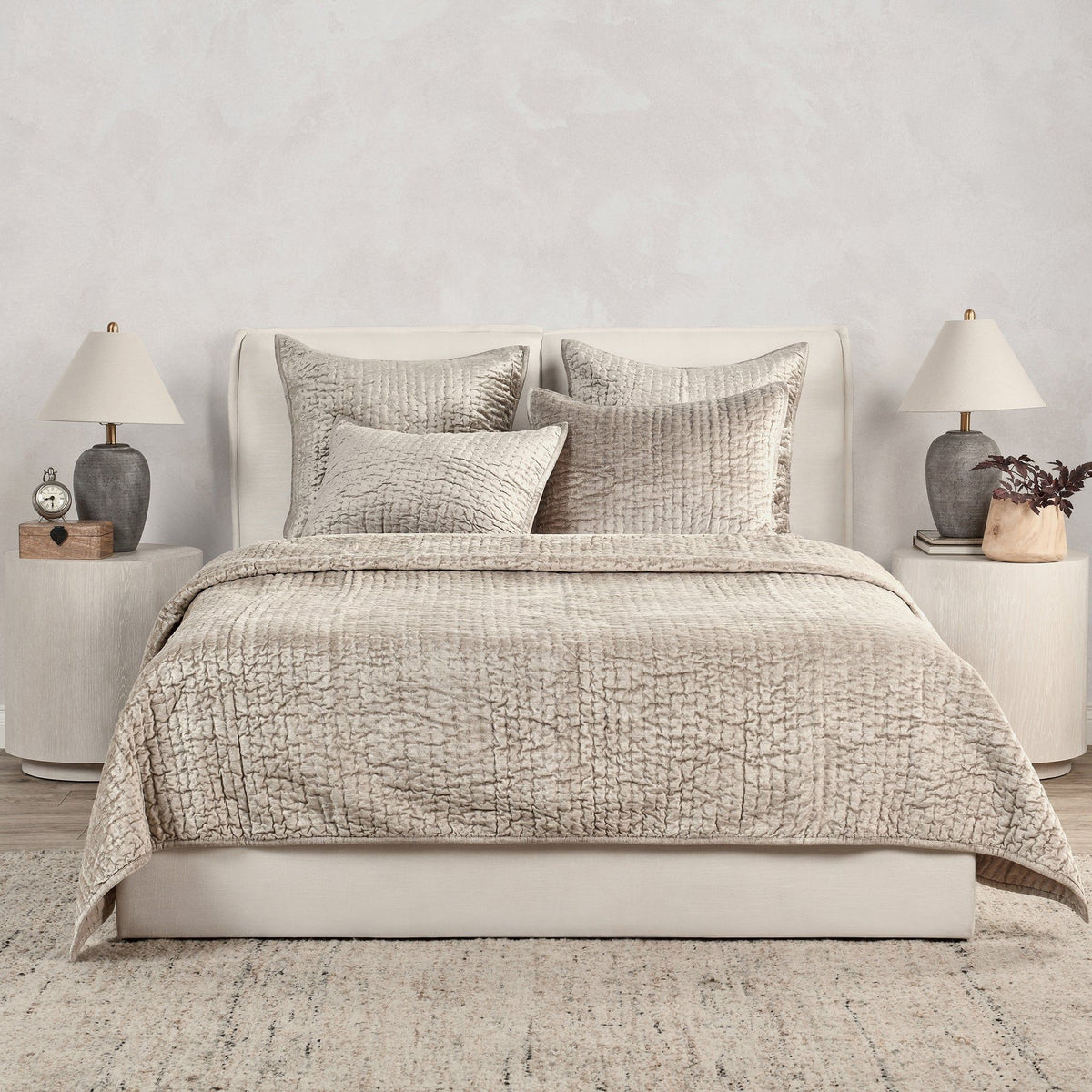 Velvet quilt set with matching shams from Classic Home, featuring plush fabric and elegant design for a cozy bedroom decor.