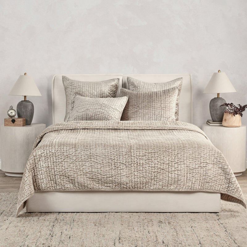 Velvet quilt set with matching shams from Classic Home, featuring plush fabric and elegant design for a cozy bedroom decor.