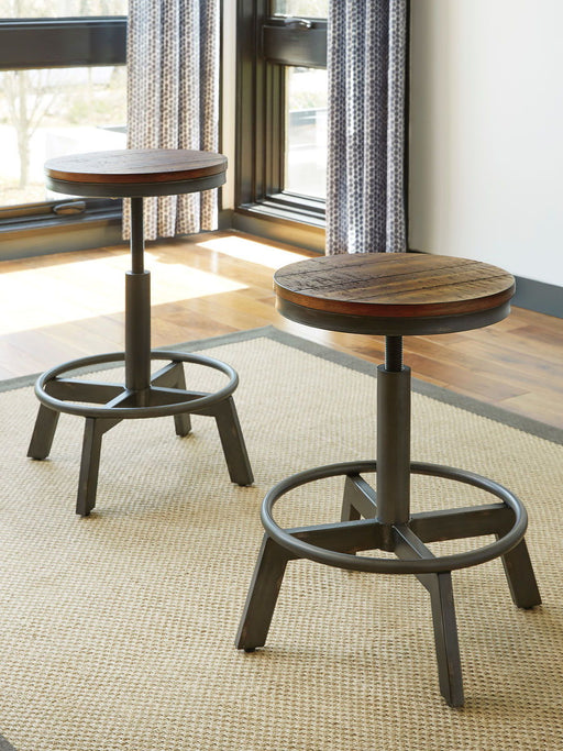Torjin - 3 Pc. - Long Counter Table, 2 Stools - Dark Brown - R&R Furniture Gallery (Fountain Valley, CA)
