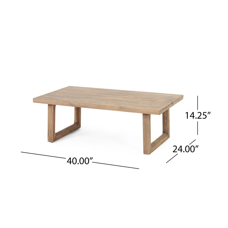 Noble House 4-piece acacia wood outdoor patio furniture set with beige cushions, including chairs and a coffee table, in a backyard setting.