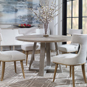 Uttermost Gidran dining table with a sleek wooden surface and modern design, perfect for contemporary dining rooms.