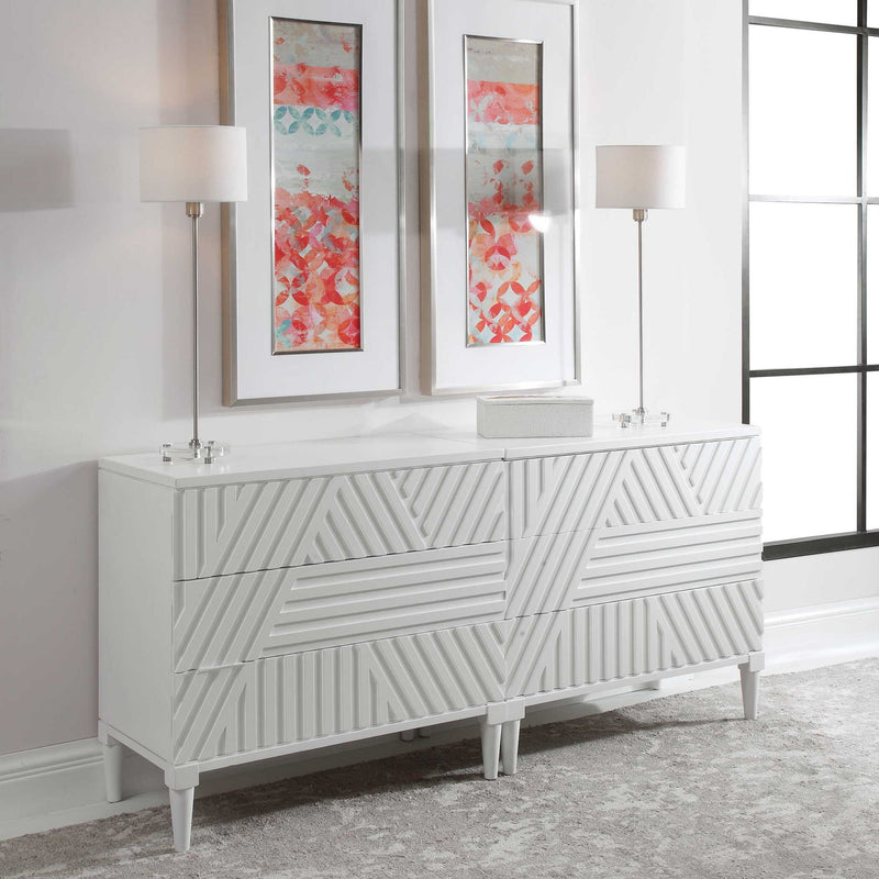 Uttermost Colby accent drawer chest with wood finish and metal hardware, featuring multiple drawers and modern design.