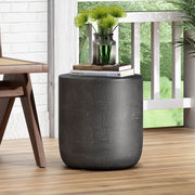 Outdoor lightweight concrete end table with natural texture and matte black finish, by Noble House, ideal for patio or garden decor.