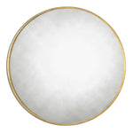 Uttermost Junius round wall mirror with sleek metal frame, hanging on a modern wall, showcasing its contemporary design.