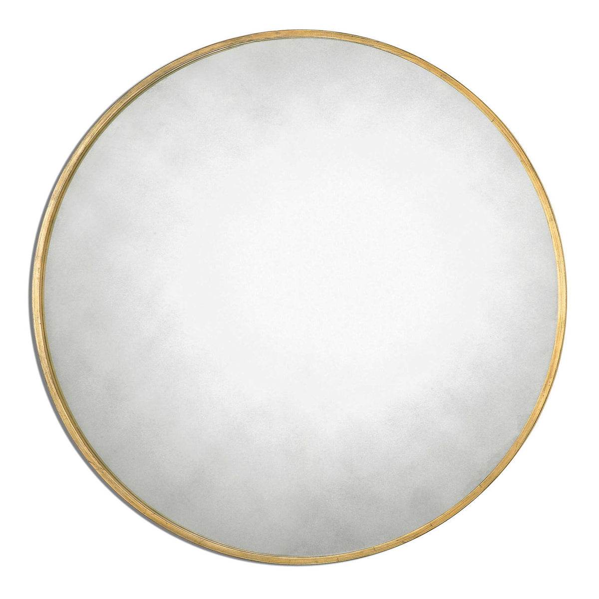 Uttermost Junius round wall mirror with sleek metal frame, hanging on a modern wall, showcasing its contemporary design.