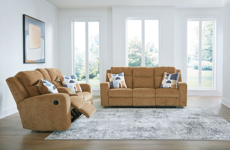 Signature Design by Ashley Kanlow reclining living room sofa set with plush cushions and reclining features, ideal for comfortable seating.