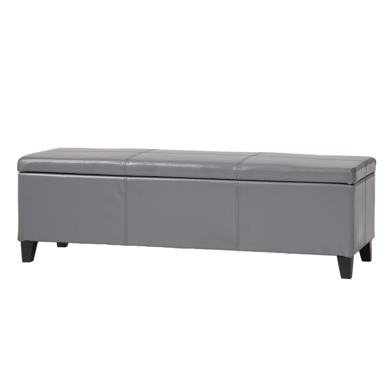 Noble House Glouster contemporary storage ottoman with soft fabric upholstery and a cushioned top in a modern living room setting.