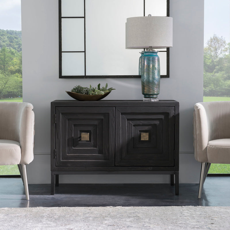 Uttermost Aiken accent cabinet with a sleek wood finish and modern design, featuring storage drawers and decorative hardware.