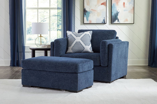 Benchcraft Evansley living room set with stationary chair and matching ottoman in a cozy, modern fabric design.