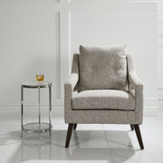 Uttermost O'Brien armchair with plush fabric upholstery and elegant design, showcasing a comfortable and stylish seating option.