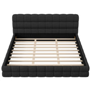 Dreamland upholstered platform bed with plush headboard, featuring a modern design and soft fabric in a cozy bedroom setting.