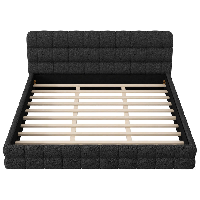 Dreamland upholstered platform bed with plush headboard, featuring a modern design and soft fabric in a cozy bedroom setting.