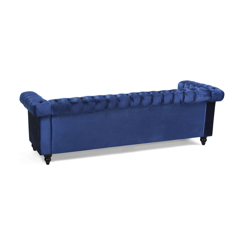 Noble House Chesterfield style 3-seater sofa with deep button tufting and plush upholstery, stationary design in a classic living room setting.
