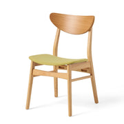 Noble House contemporary side dining chair with sleek modern design, featuring smooth curves and a stylish finish.