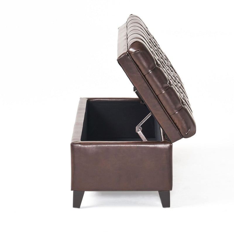 Noble House Juliana storage ottoman with birch legs, upholstered in neutral fabric, featuring a spacious top for storage and seating.