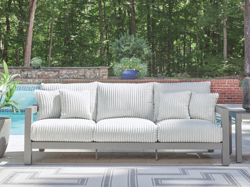 Gray Hurley Park sofa with cushion by Signature Design Ashley, featuring plush upholstery and contemporary design.