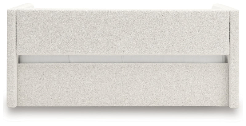 Signature Design by Ashley upholstered Arloster day bed with plush fabric, wooden legs, and a modern, stylish design.