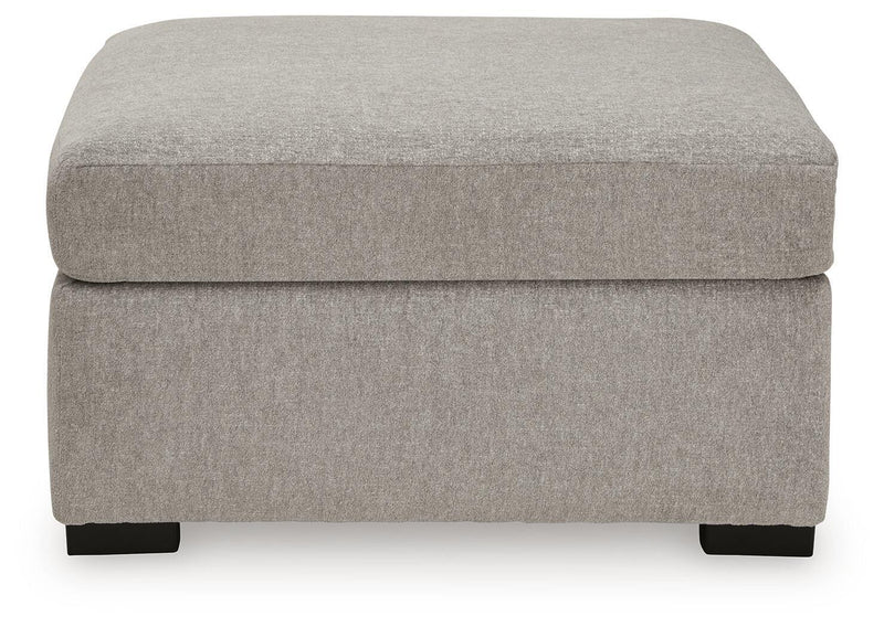 Benchcraft® ModMax Luxe oversized accent ottoman in Flint fabric, featuring a plush, contemporary design for stylish living spaces.