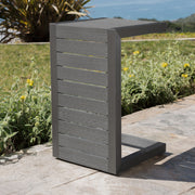 Noble House aluminum outdoor C-shaped side table for patio with sleek, modern design and smooth surface.