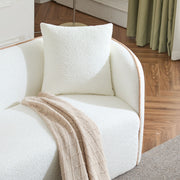 Noble House Coral curved 3-seater stationary sofa with plush cushions and modern design in a living room setting.