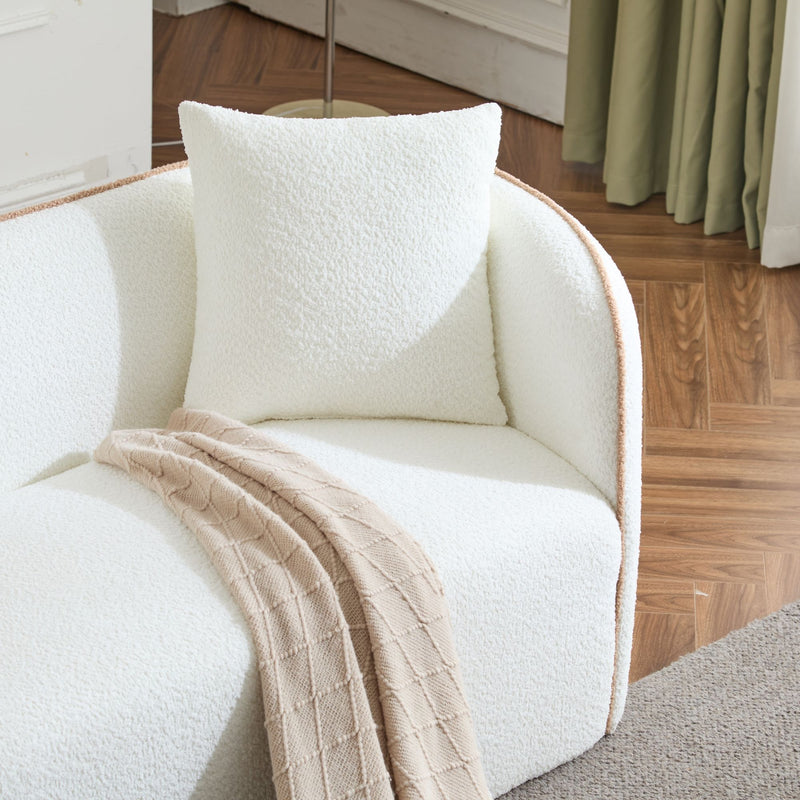 Noble House Coral curved 3-seater stationary sofa with plush cushions and modern design in a living room setting.