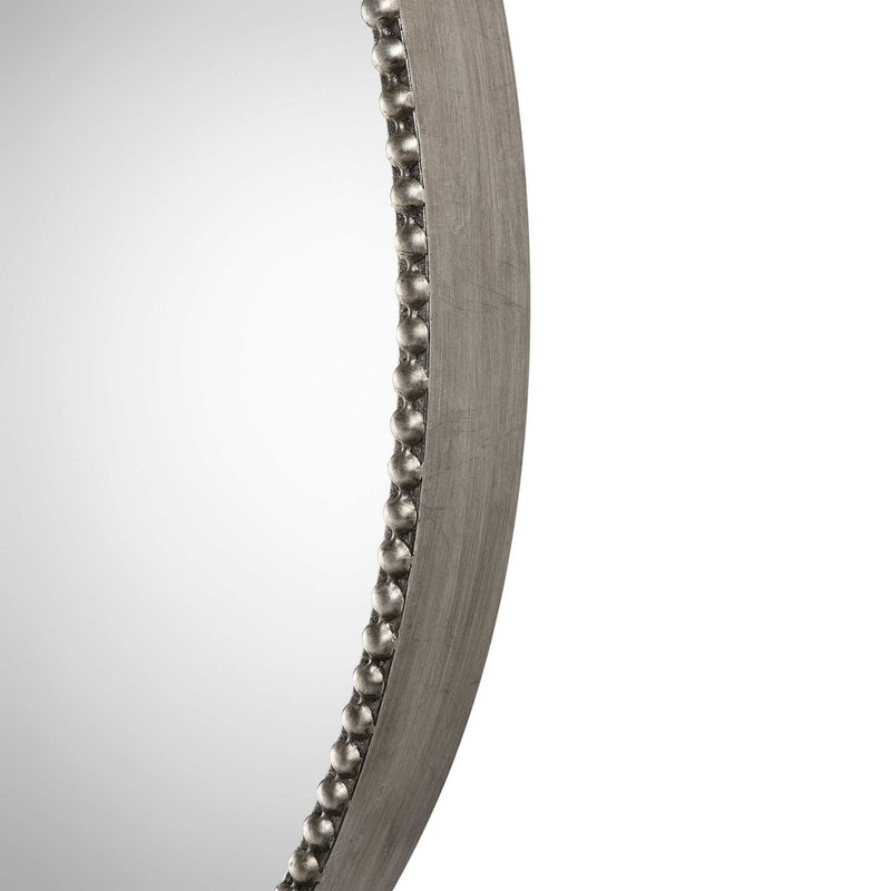 Beaded round wall mirror with pearl silver frame by Uttermost, showcasing intricate bead details and reflective glass surface.