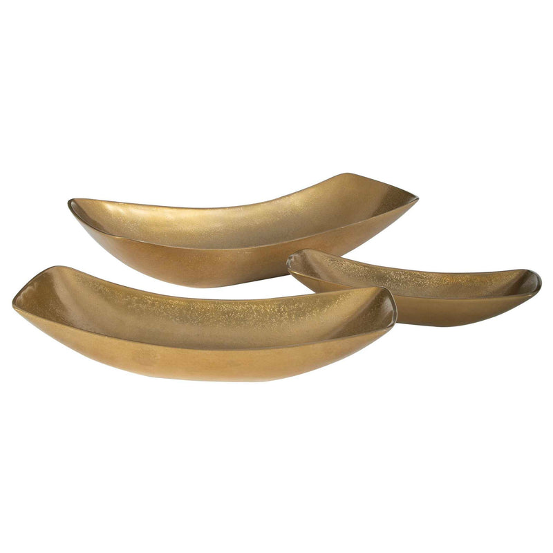 Set of three Anas brass bowls from Uttermost with antique finish, featuring smooth rounded shapes and decorative details.