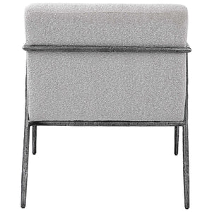 Light gray Uttermost Brisbane accent chair with a modern design, featuring a cushioned seat and sleek wooden legs.