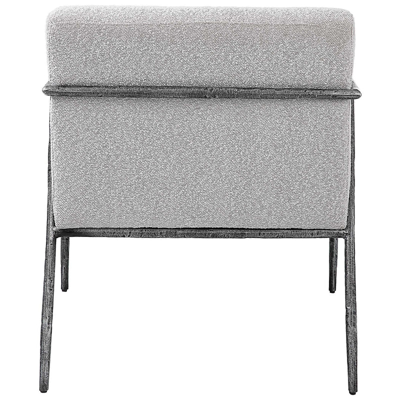 Light gray Uttermost Brisbane accent chair with a modern design, featuring a cushioned seat and sleek wooden legs.